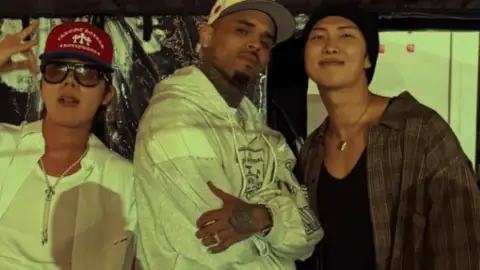 RM e J-Hope, do BTS, são criticados por fãs após marcarem presença em show de Chris Brown